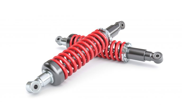 car shock absorbers with red spring on the white background. 3d render